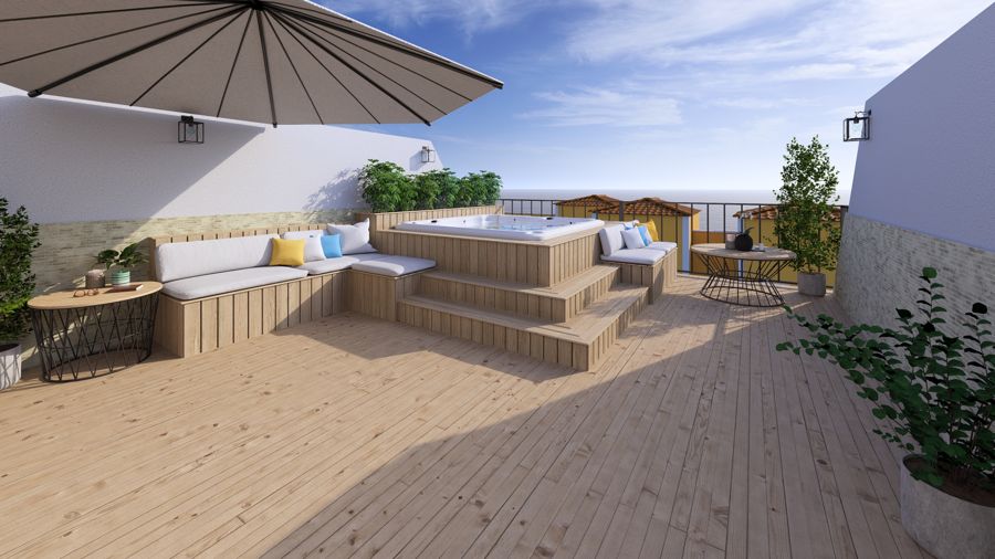 Chill-out cubierto con jacuzzi integrado y vistas al mar.