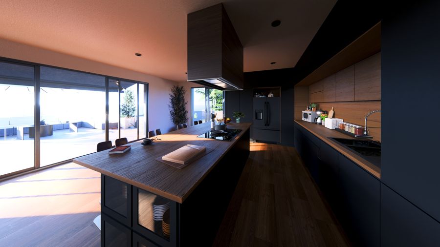 Cocina en tonos oscuros con encimera de madera.